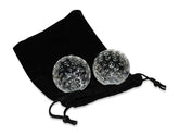 Gemsho Glass golf-ball whiskey chillers on a bar for undiluted cold drinks.