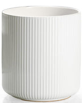 Getstar large ceramic utensil holder on the counter keeps spatulas organized.