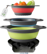 Gevoli collapsible colander on sink in red with self-draining base for quick drainage.