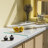 GlassCuisine tempered glass cutting board with lips offers stable prep and clean edges.