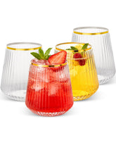 Goodluck stemless wine glasses with clear ribbing and gold rim for 12oz servings at celebrations.