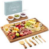 Grazerie charcuterie board acacia wood with utensils ideal for entertaining guests.