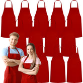 Green Lifestyle 12-pack red bib aprons laid out for bulk kitchen use.