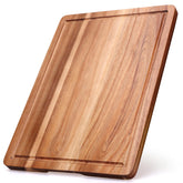 Gtencemen Acacia cutting board front with juice slot for meat prep.