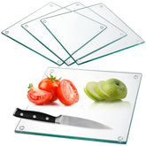 Hacaroa four-pack tempered glass cutting boards with non-slip feet for stable prep