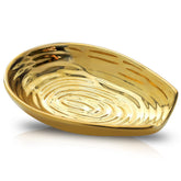 HASENSE spoon rest on stovetop with gold ceramic finish keeps counters clean.