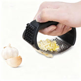 HavenNest garlic press with soft ergonomic handle for comfortable gripping.
