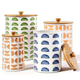 HB Design Co patterned iron canisters with airtight lids on a counter for flour storage