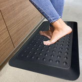 HEALEG 1-inch thick anti-fatigue mat supports comfort in kitchen and office tasks.