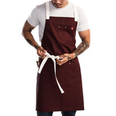 Hedley & Bennett crossback apron pockets close-up showing ergonomic straps reducing neck strain.