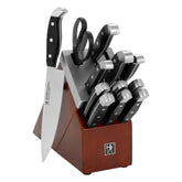 Henckels Statement 13pc self-sharpening knife block set on counter enhances daily slicing tasks.
