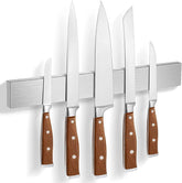 HereOF magnetic knife holder on wall keeps chef knives secure and accessible.