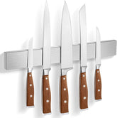 HEREOF Magnetic Knife Strip wall-mount close-up showing strong magnets for secure blade storage.