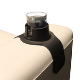Hit Products CouchCoaster on armrest holds a mug securely, preventing spills while relaxing on a sofa.