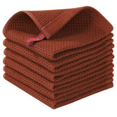 Homaxy waffle weave dishcloth in rust color for quick drying.