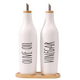HOMCDALY olive oil dispenser with a bamboo cap for easy pour and fresh-tuned oil
