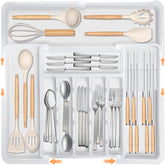 Homecor silverware organizer in full-extend mode fits large drawers with organized utensils.