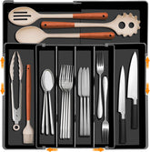 Homecor expandable silverware organizer in a wide drawer for quick access.