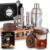Homia Bartender Kit on a bamboo stand for elevated cocktails