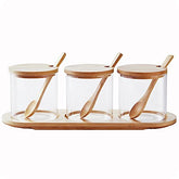 HONGCHU 3-pack condiment pots with bamboo spoons and lids for organized kitchen storage.