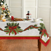 Horaldaily Christmas tablecloth with poinsettia and golden ribbon protects surfaces and adds festivity.
