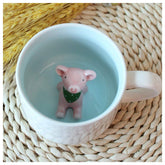Hotmiss pig-pattern ceramic cup with hidden 3D cow inside for a playful morning