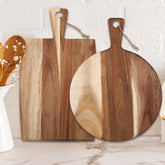 Hsei round acacia cutting board with handle for versatile prep and cheese service.