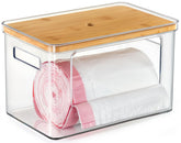 Hudgan stackable storage with bamboo top keeps laundry organized and bags accessible.