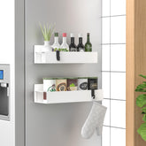 HuggieGems magnetic spice rack on refrigerator side for easy access and space saving.