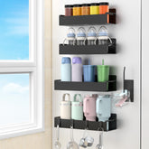 HuggieGems magnetic water bottle holder on fridge keeps bottles secure and easily accessible.