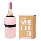 Huski Wine Chiller pink-sleek-design on table cools wine while adding style