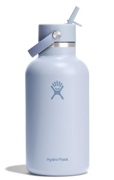 Hydro Flask 64oz Surf Blue Wide Mouth bottle on trail keeps drinks cold.