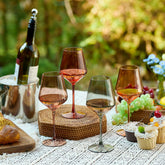 Imourari stemmed colored wine glasses in amber crystal for elegant dining.