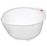 Inomata rice washing bowl with side drain for quick rinsing.