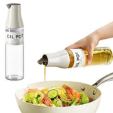 JANSSE olive oil dispenser with auto flip for drip-free pouring.