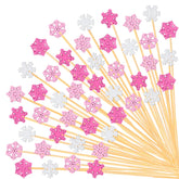 JarThenaAMCS winter snowflake picks in pink and white, ideal for festive cocktail garnishes
