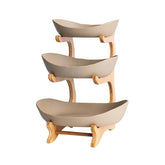 Jessie 3-tier ceramic fruit basket on counter keeps fruit organized.