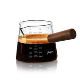 Joeyan dual spouts measuring cup enables precise, spill free pouring for cooking and coffee prep.
