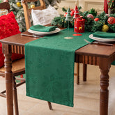Joyfol Day waterproof jacquard Christmas table runner in green poinsettia close-up for durability.