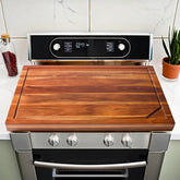 Jubilander stove cover board in acacia wood adds extra prep surface for busy kitchens