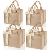 Karinoos burlap tote set with handles and ribbon, ideal for durable beach days and shopping.