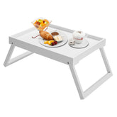 Kaukinye bamboo bed tray with folding legs for easy transport and versatility.