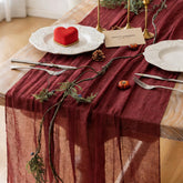 Keketoarrange burgundy table runner on a table adds vintage charm