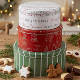 KIBAGA Christmas cookie tin in green stripes holds cookies for gifting.