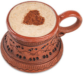 KIBS Potbelly mug in blue, unglazed clay for cozy coffee moments.