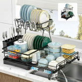 Kicyosl 2-tier dish drying rack extended showing expanded capacity on a counter.