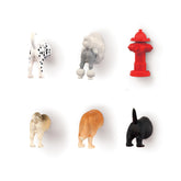 Kikkerland dog butt magnet on fridge holding reminders