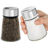 Kitchen-GO salt and pepper shakers with adjustable pour holes for precise seasoning at the table.