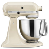 KitchenAid Artisan tilt-head mixer with almond cream and pouring shield for mess-free pouring.