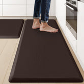 KitchenClouds two-piece kitchen mats on the floor for enhanced standing comfort.